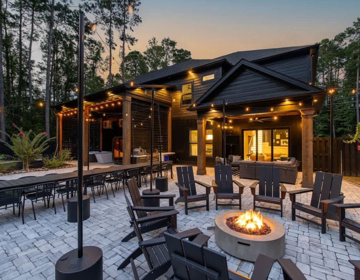 Outdoor fire pit and lounge area at the Birdie House