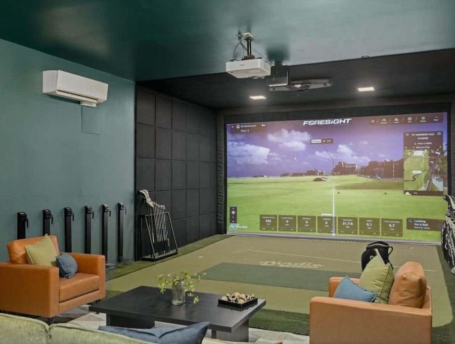 Indoor golf simulator lounge at the Birdie House